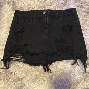 Black distressed denim skirt